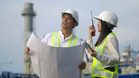 Two industrial engineer working near the electrical plant. Stock Footage 233284403