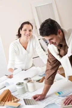 Two interior designer working at office with color swatch 写真素材