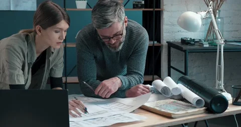 Two Interior Designers Choosing Color style of Working Project at Workplace Stock Footage 153694932