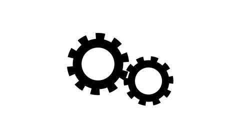 Two interlocking black gears on a white background representing teamwork me.. Stock Footage 340123651
