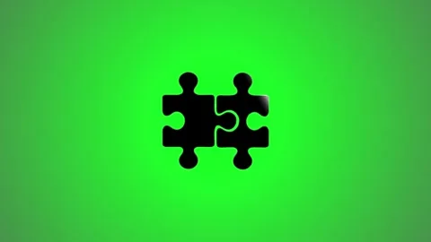 Two interlocking puzzle pieces representing connection and teamwork on gree.. Vídeos de archivo 346496246