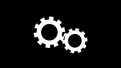 Two interlocking white gears on a black background representing teamwork in.. Stock Footage 340123653