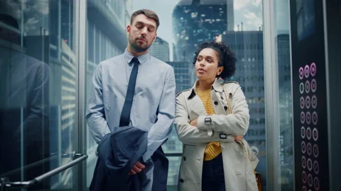 Two International Businessmen in Elevator Stock Footage 167556219