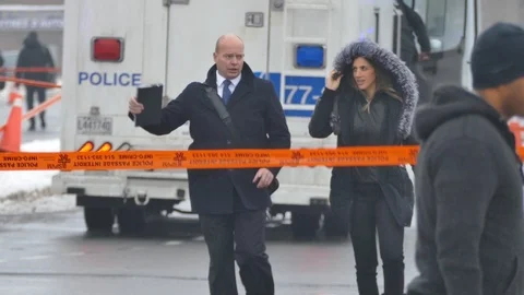 Two investigators chatting Stock Footage 103953523