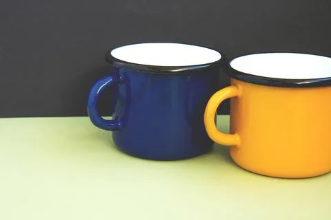 Two iron mugs on the table Stock Photos