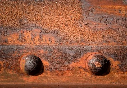 Two iron rivets Stock Photos