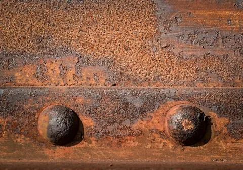 Two iron rivets Stock Photos