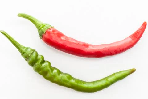Two isolated chilies Stock Photos