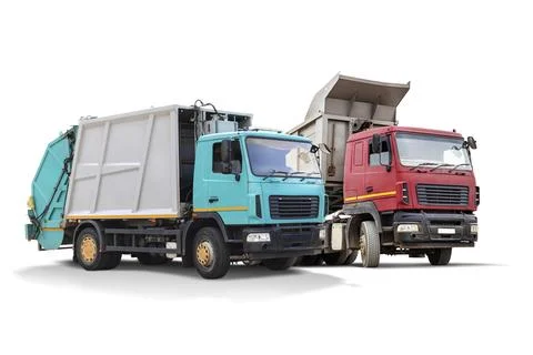 Two isolated construction vehicles are parked, one turquoise and one red. Bot 스톡 사진