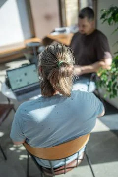 Two It Software engineers working on project and programming in coffee shop Stock-Fotos