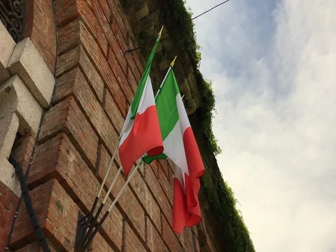 Two Italian flags on an ancient building. Stock-Footage 78693833