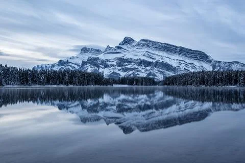 Two jack lake and mt rundle during late fall in Banff national park in late fall Stock Photos