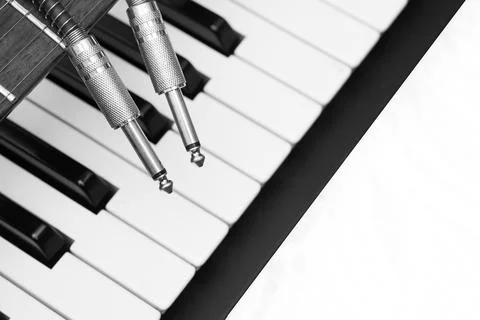 Two jacks for connection with piano synth keyboard keys Stockfoto's
