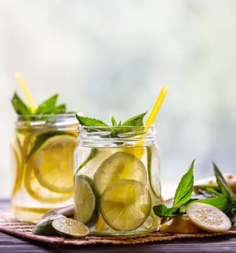 Two jars with cold lemonade Stock Photos