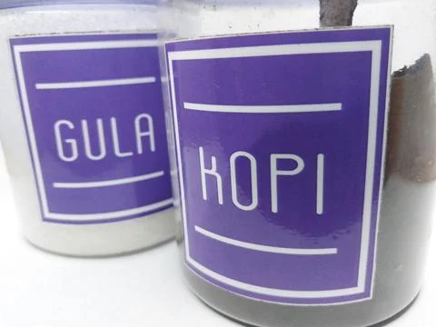 Two jars filled with coffee and sugar Stock Photos