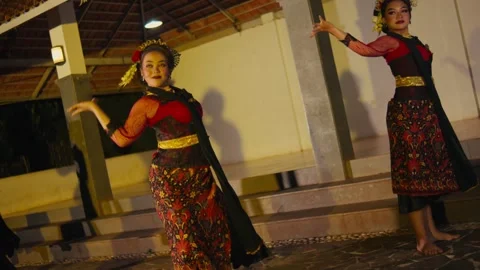 Two Javanese Dancers Performing Synchronized Traditional Dance Stock Footage 257156918