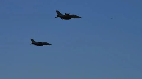 Two jet planes fly in the sky in parallel Video stock 163261365