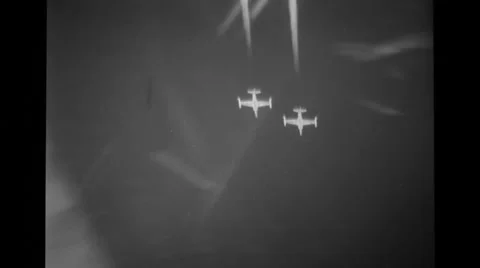 Two jets flying high up in the sky Stock Footage 36423732