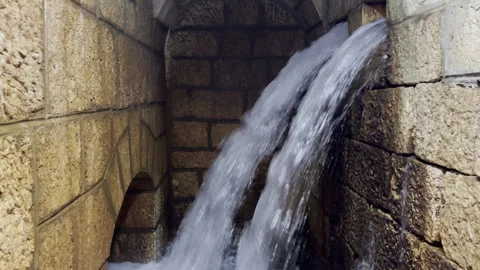 Two Jets of Water Flow Parallel in an Old Tunnel With Mold From the 19th century Stock Footage 258114969