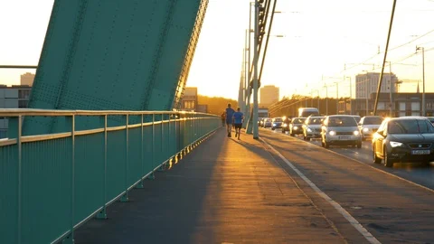 Two Joggers Running While Facing The Sun Stock Footage 96241978