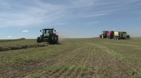 Two John Deere Tractors Bailing Driving Different Directions Stock Footage 40456370