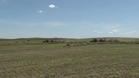 Two John Deere Tractors Bailing Far Shot Stock Footage 40461720