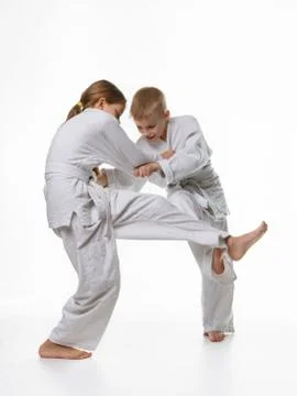 Two judo students try to hook each other up Stock Photos