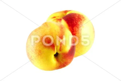 Two juicy fresh nectarines Stock Photos