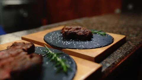 Two juicy steaks on a platter. Stock Footage 145855852