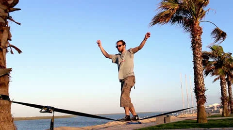 Two jumps on a slackline Video stock 24728612