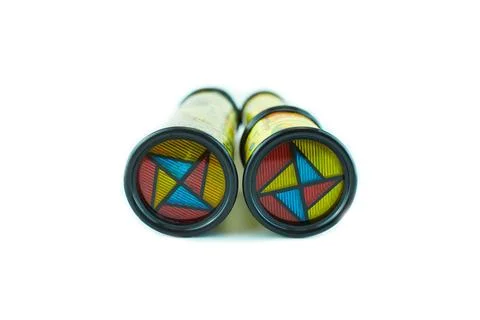 Two kaleidoscopes on white background. Stock Photos