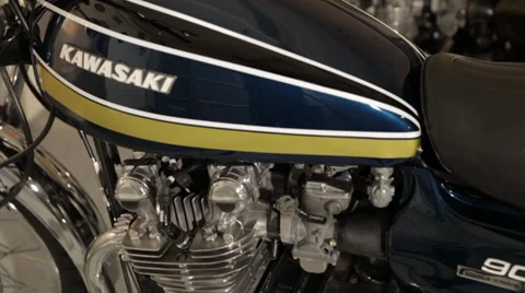 Two Kawasaki bikes together pan up Stock Footage 34333945