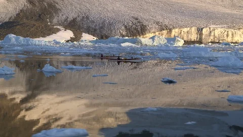 Two kayakers sailing in the Arctic Ocean, Greenland Video stock 103512835