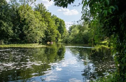 Two kayaks float peacefully on the River Lea near Enfield Lock, Stock Photos
