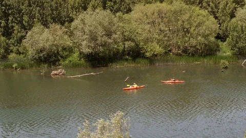 Two Kayak‘s paddle on river in La Rioja, Spain Stock Footage 97988014
