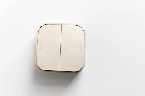 Two-key light switch on a white background. Stock Photos