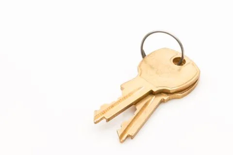 Two keys on a ring on white background. Stock Photos
