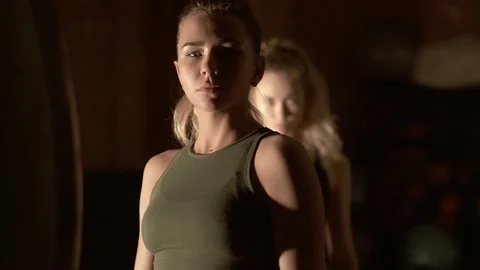 Two kickboxer girls are posing in front of the camera. Slow motion. Stock Footage 88730345