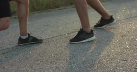 Two kickboxers practising paired combat receptions on sunny nature Vídeo Stock 133532951