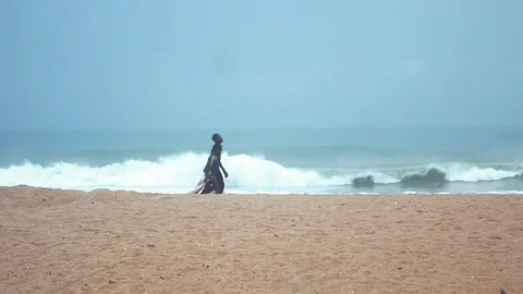 Two kids along ocean Stock Footage 81214376