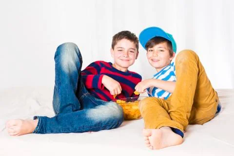 Two kids in bed Stock Photos