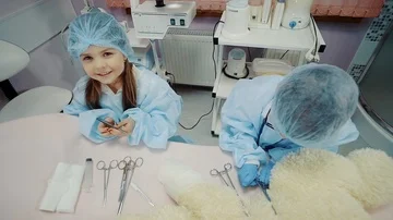 Two kids choosing the profession Video stock 85794911