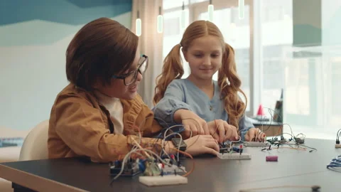 Two Kids Constructing Robots Video stock 153463960