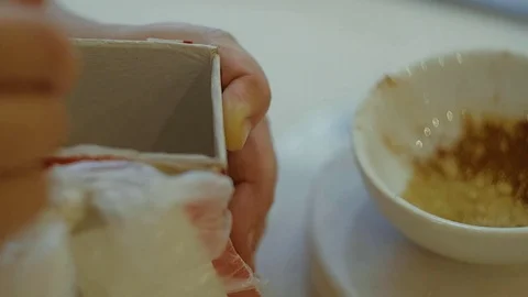Two kids kneading the dough for make cookies together Stock Footage 82964477
