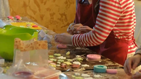 Two kids kneading the dough for make cookies together Video stock 83521902