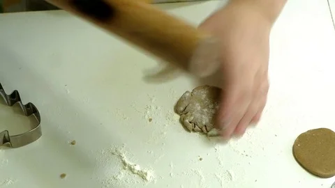Two kids kneading the dough for make cookies together Stock Footage 83869616