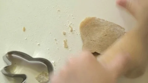 Two kids kneading the dough for make cookies together Stock Footage 84009778