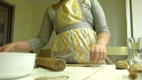 Two kids kneading the dough for make cookies together Stock Footage 84133907