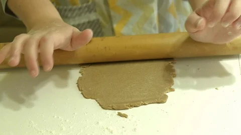Two kids kneading the dough for make cookies together Stock Footage 84198680