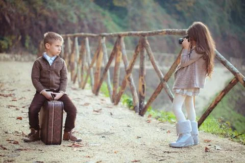 Two  kids playing in park. Stock Photos